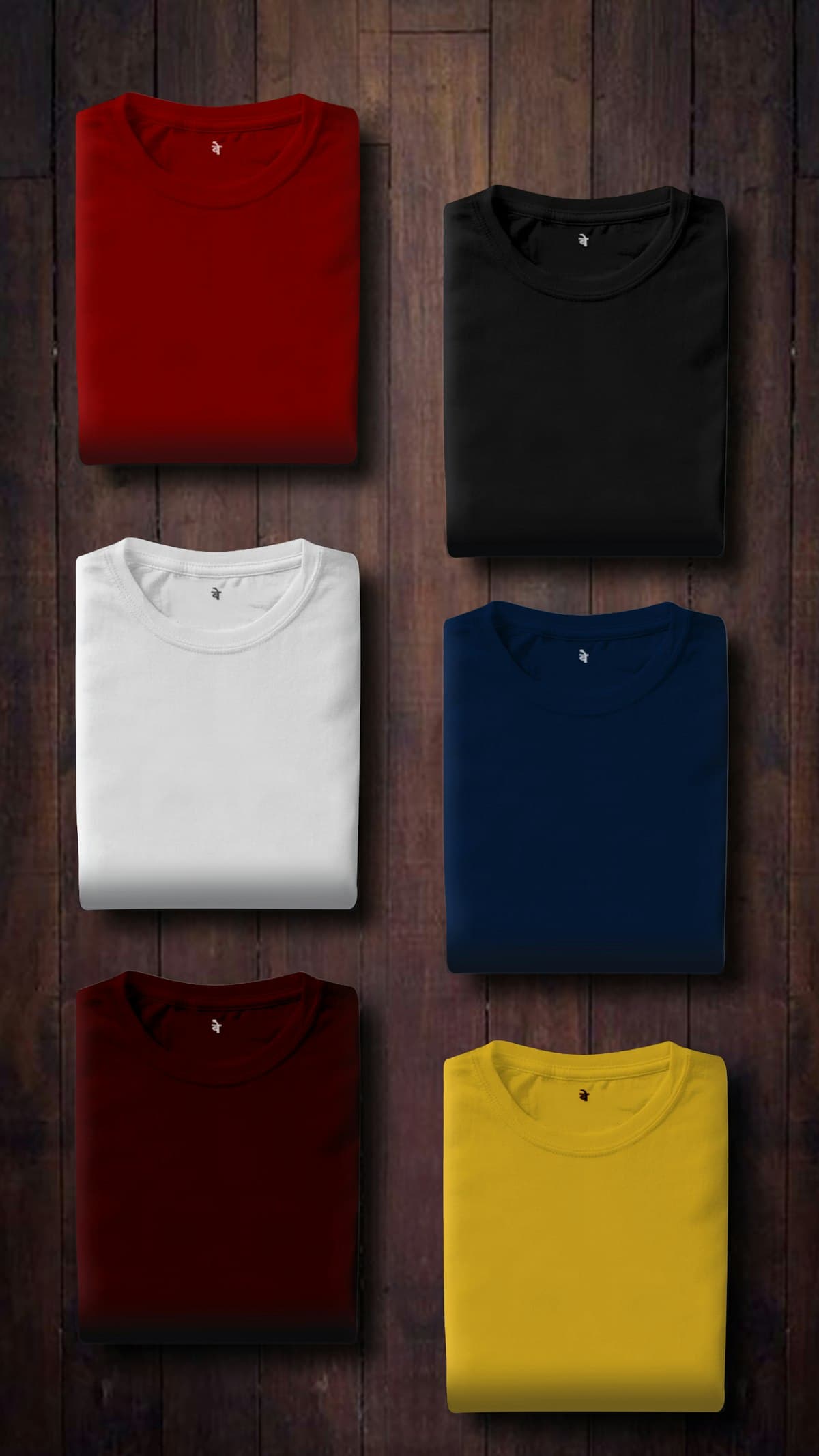 Playeras de algodón dobladas en varios colores